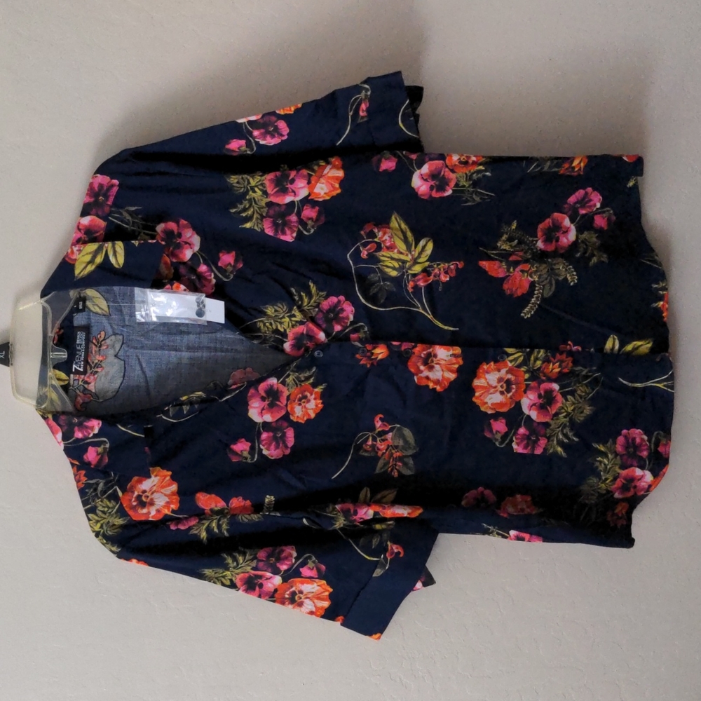 Women's button up blouse.  Size Large. Navy blue flower print.  New with Tags.